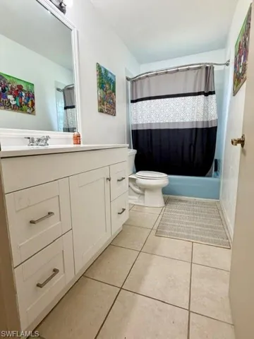 The guest bathroom is conveniently located with a tub/shower combo