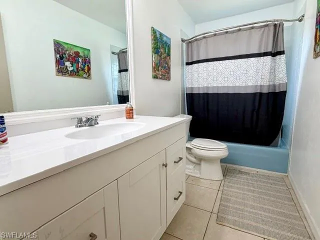 The guest bathroom is conveniently located with a tub/shower combo