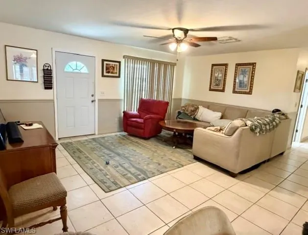 A substantial living room at 17' x 12'