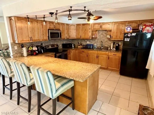 A large breakfast bar is the prefect spot for your morning coffee or tea