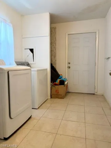The laundry room is HUGE at 11' x 8', with garage & outdoor access