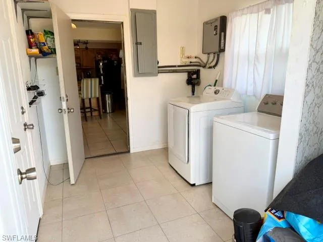 The laundry room can easily be used for any extra storage needs