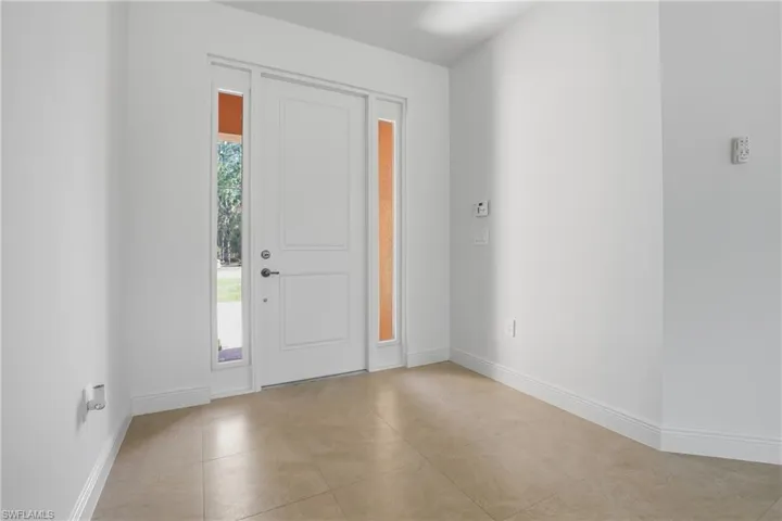 Entrance foyer with baseboards