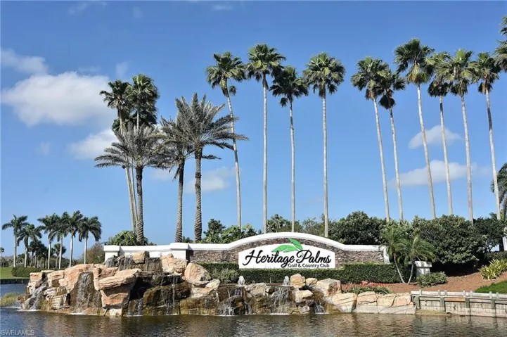 Community sign with a water view