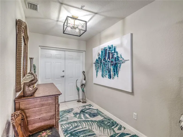 Double door entry leading into the foyer for amazing views the minute you step into the condo