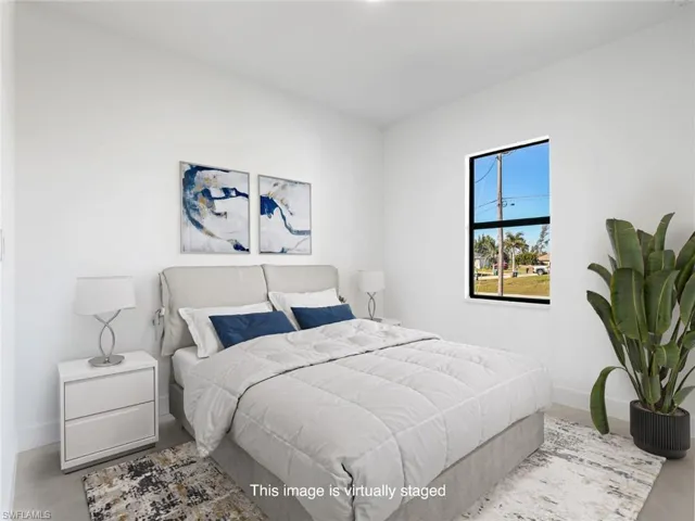 Bedroom with baseboards