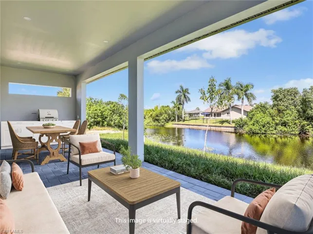 View of patio / terrace with outdoor lounge area, a water view, and outdoor dining area