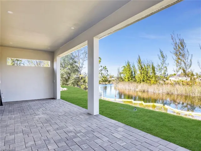 View of patio / terrace featuring a water view