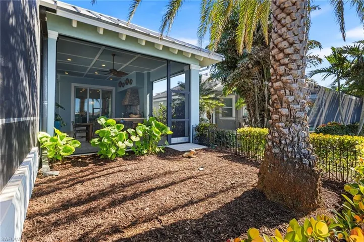 View of yard featuring ceiling fan