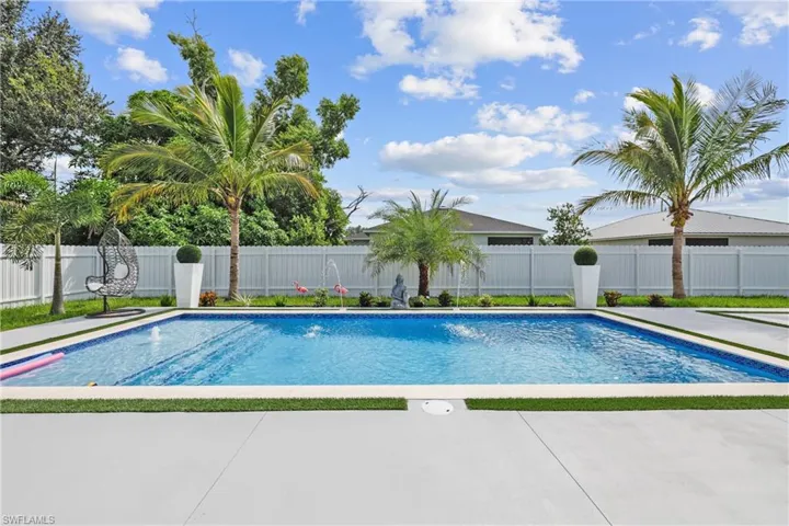 View of pool featuring a fenced backyard and a patio
