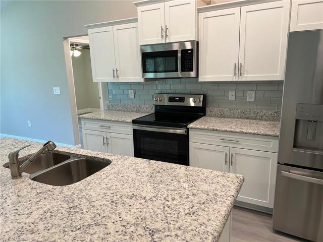 611 Truman AVE, LEHIGH ACRES FL 33972