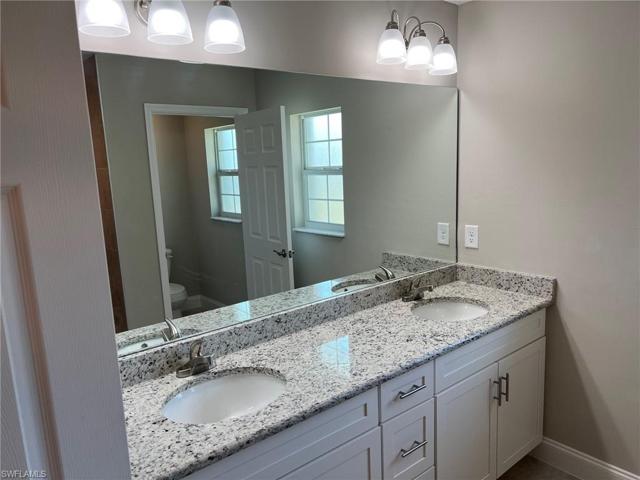 611 Truman AVE, LEHIGH ACRES FL 33972