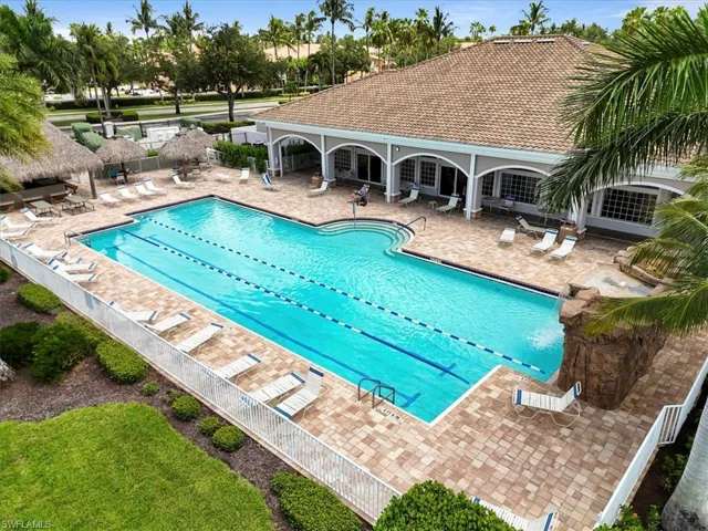 Dining area featuring light tile patterned floors and a chandelier