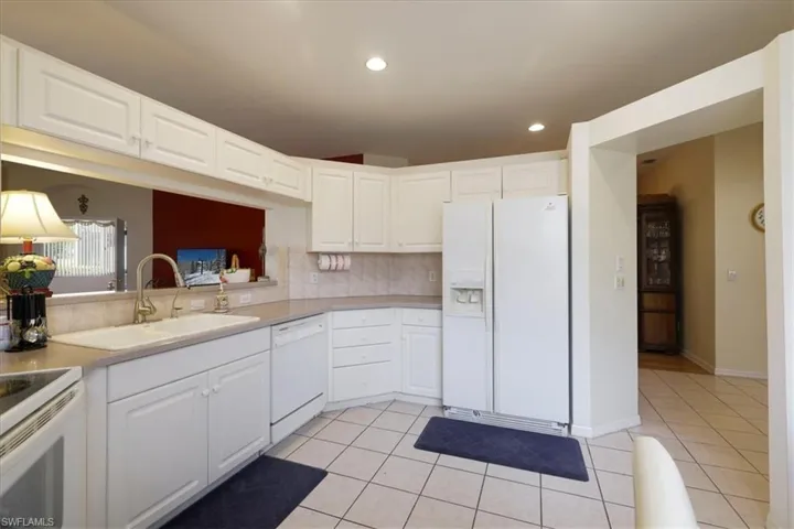 Bedroom with wood finished floors and ceiling fan