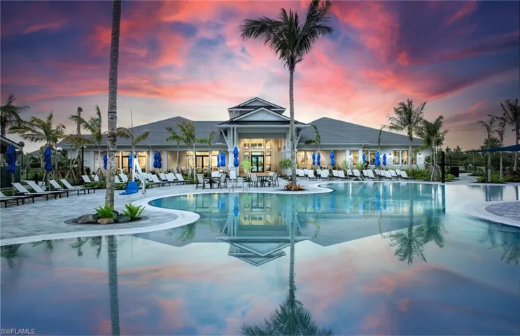 Community pool with a patio