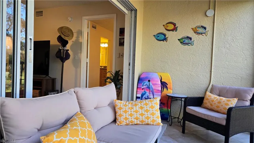 Sliding doors from living room bring the fresh air in.