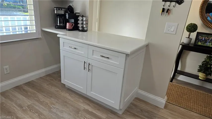 Extra bank of cabinets for your coffee bar and open space ready for a wine refrigerator