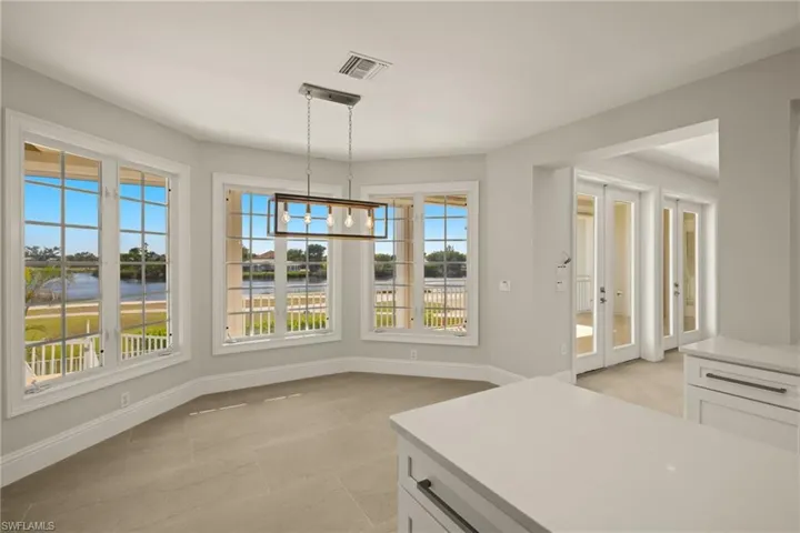 Dining space featuring a notable chandelier