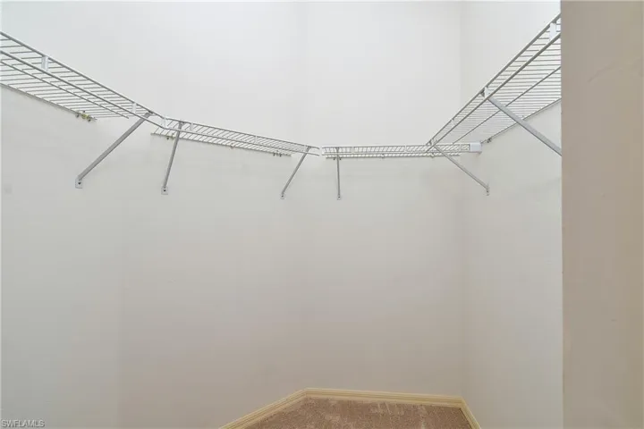 Large Master BR walk-in closet; another standard closet located across from this walk- in