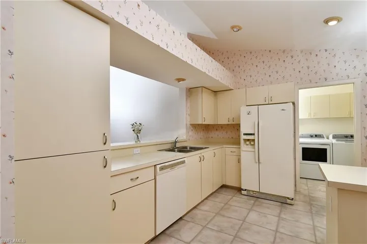 Long view of the kitchen; Pantry on immediate Left