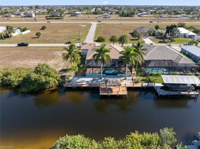 Aerial view of residential area with a nearby body of water