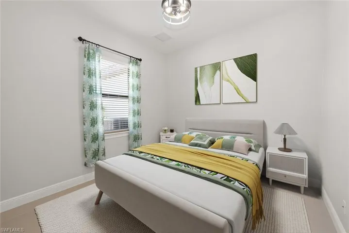 Bedroom featuring baseboards