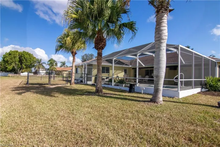 View of yard featuring a lanai