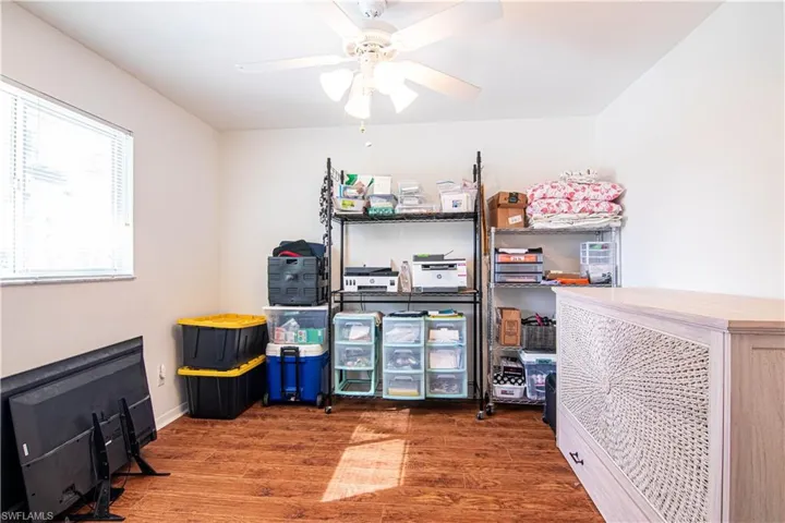 Storage area featuring ceiling fan