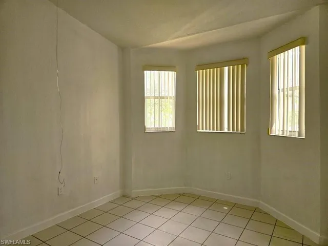 View of tiled spare room