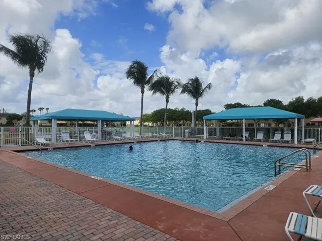 View of swimming pool with a gazebo