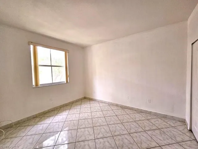 View of tiled empty room