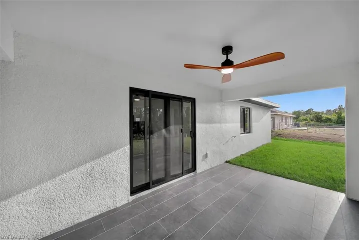 View of patio / terrace featuring a ceiling fan