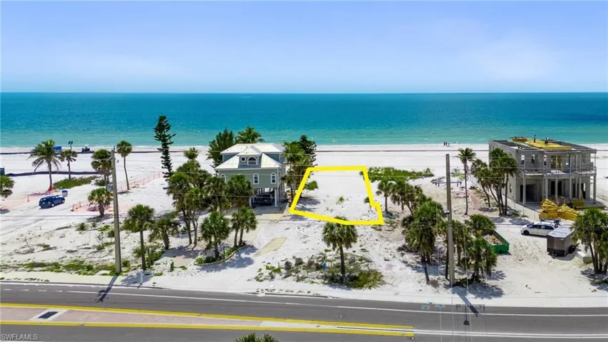 Aerial view with a water view and a view of the beach  - Virtually Edited Image