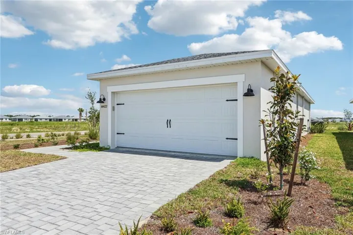 Garage with decorative driveway