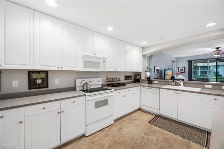 1128  Manor Lake  DR, Naples, FL 34110