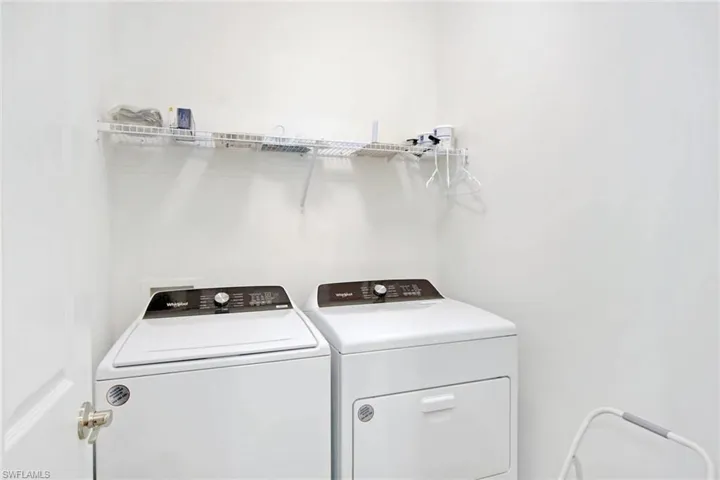 Laundry room with plenty of space to add more shelving or cabinets