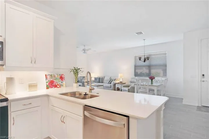Open Kit overlooks Dining Space & Great Room