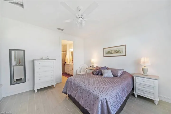 Primary Bedroom En Suite-Stylish furniture, accessories all convey with sale