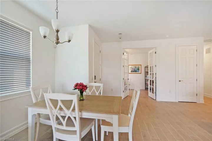 Dining room off Great Room & French doors lead to Den/Office beyond