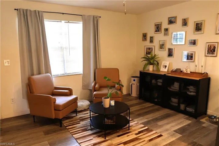 Light-toned walls with wood-finish flooring