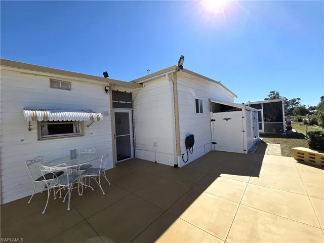 Enormous rear patio with Solar powered motion detectors & security lights