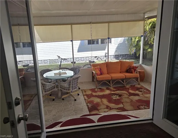 Glass double doors open from the breezeway to the Kitchen!