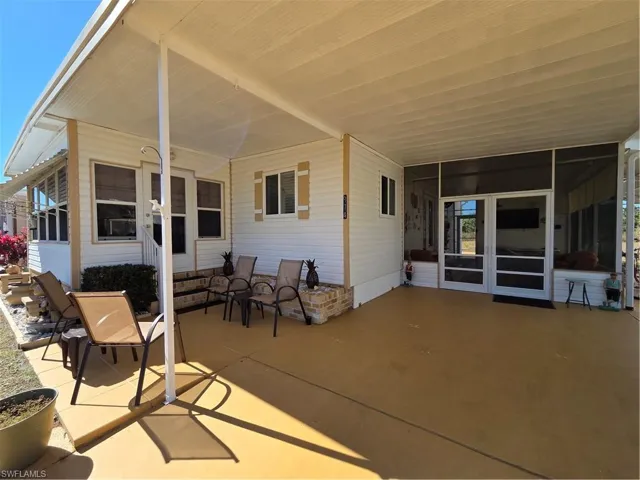 Double door entry from the carport to the breezeway, patio are leading to the Florida Room, and no shortage of parking!