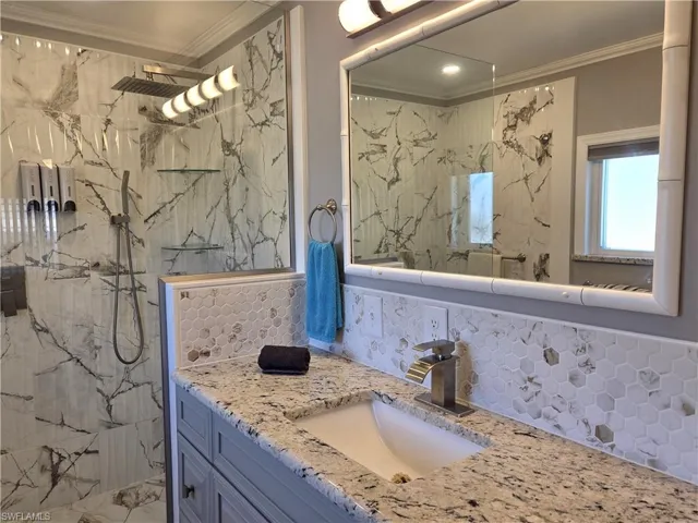 Upgraded sink, vanity, & countertop.