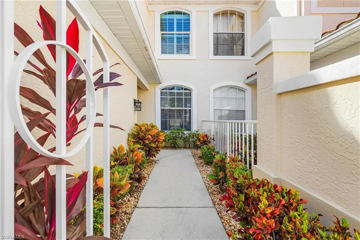 Property entrance with stucco siding