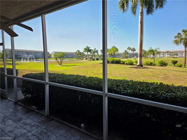 Screened patio with textured tile flooring