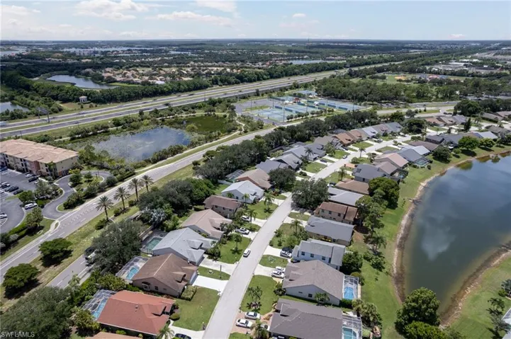 Aerial perspective showcasing a residential community with mature landscaping