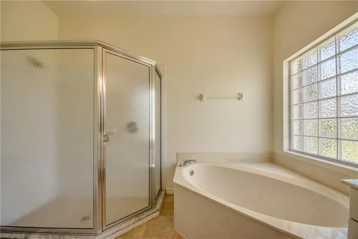 Garden Tub and large shower.