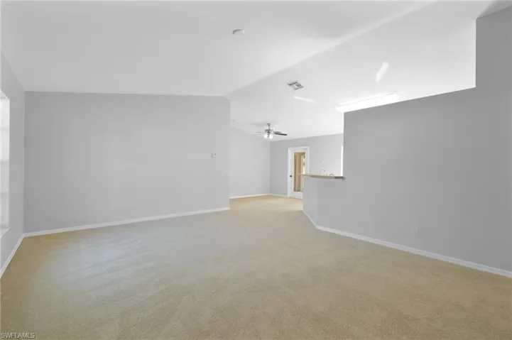 Great room with vaulted ceilings; split floor plan affords privacy