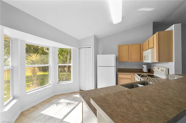 Kitchen featuring custom bay window with lots of room for bistro nook
